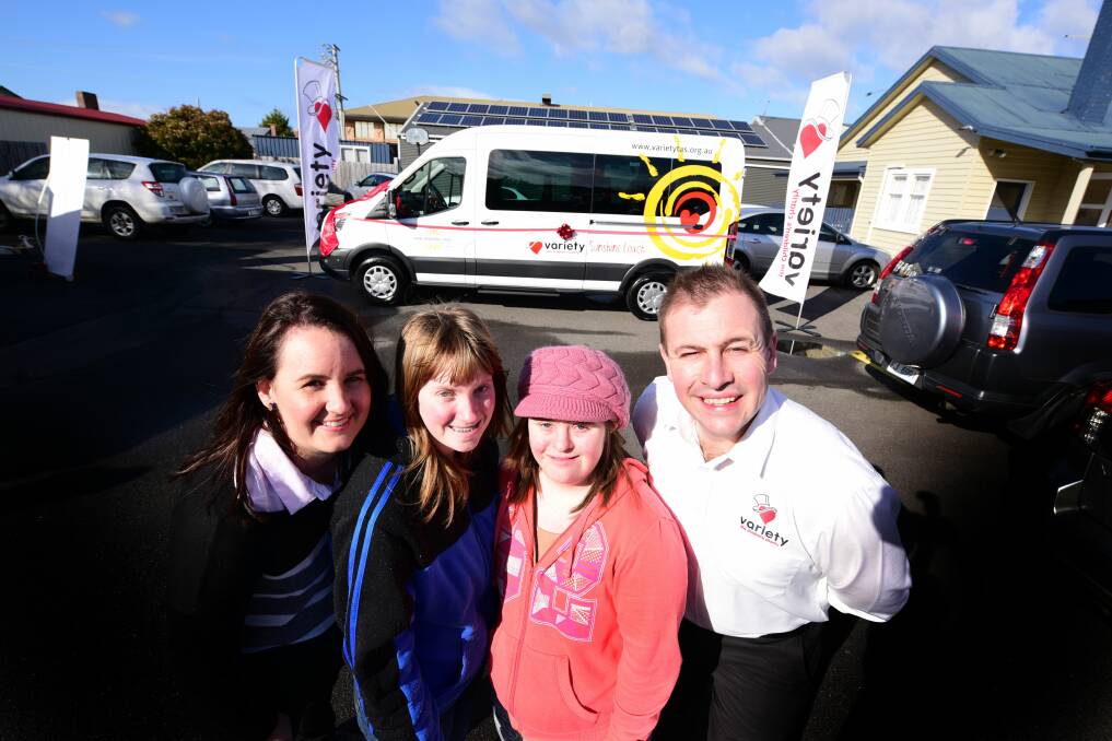 DELIGHTED: Belinda Kitto, Melody Watkins, Chloe Hanson and Luke Doyle  with the new Variety Sunshine Coach that will help children with additional needs get out in the community for additional experiences. Picture: Paul Scambler
