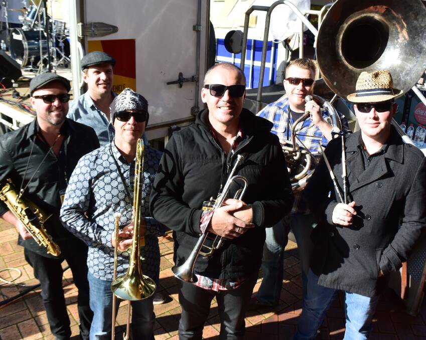 POPULAR: The Rehab Brass Band from the Hunter Valley region in NSW had crowds in the mall grooving out to their energetic set despite a cold morning.