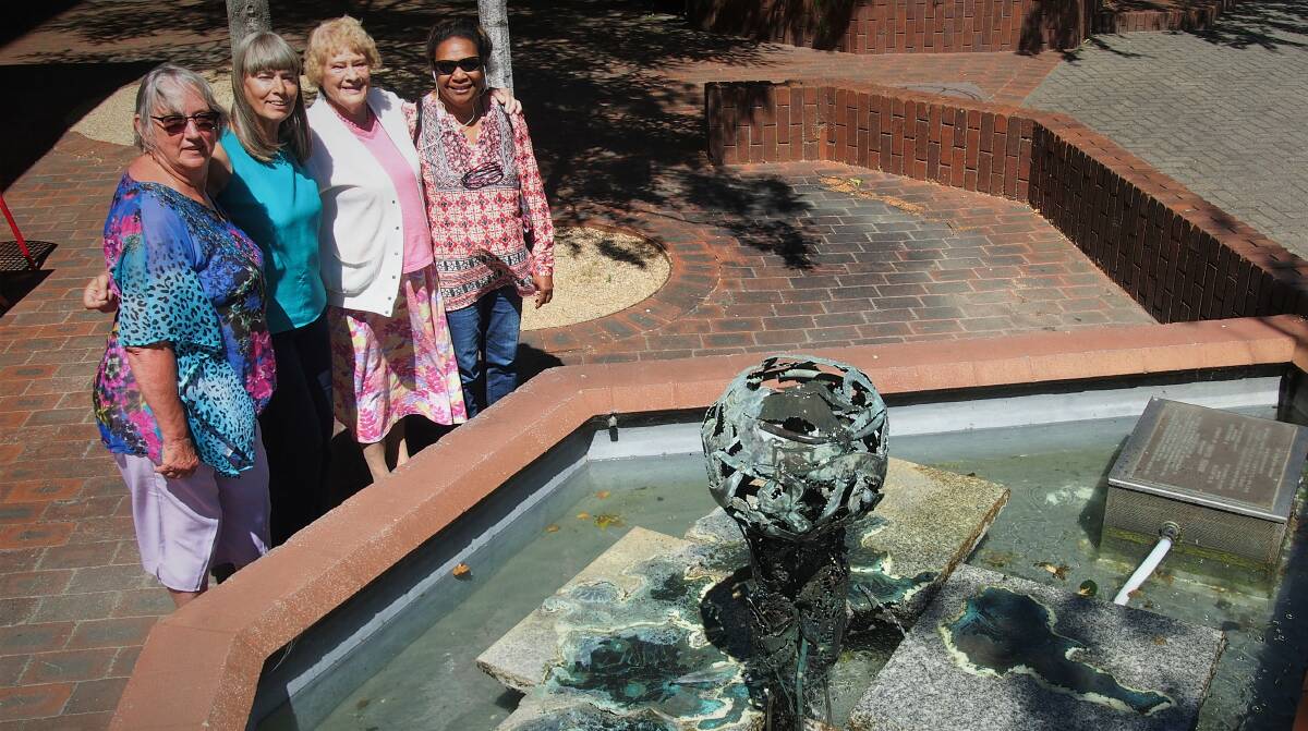 Concerned community members Julie Walpole, Karin Le, Hazel Dawe and Anna Gerard want the fountain to stay. 