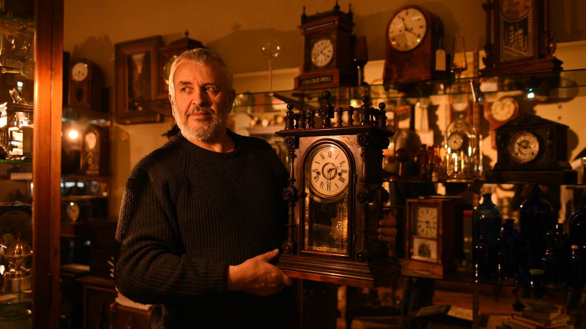TIME KEEPER: Clockwise owner Graham Mulligan is looking forward to the longer days of daylight savings, with clocks about to change for the 100th daylight savings. Picture: Scott Gelston