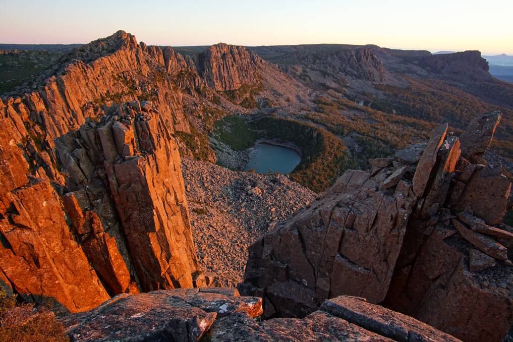 GLOWING: Denison Crags in Tasmania's north east. Picture: Rolfe de la Monte 