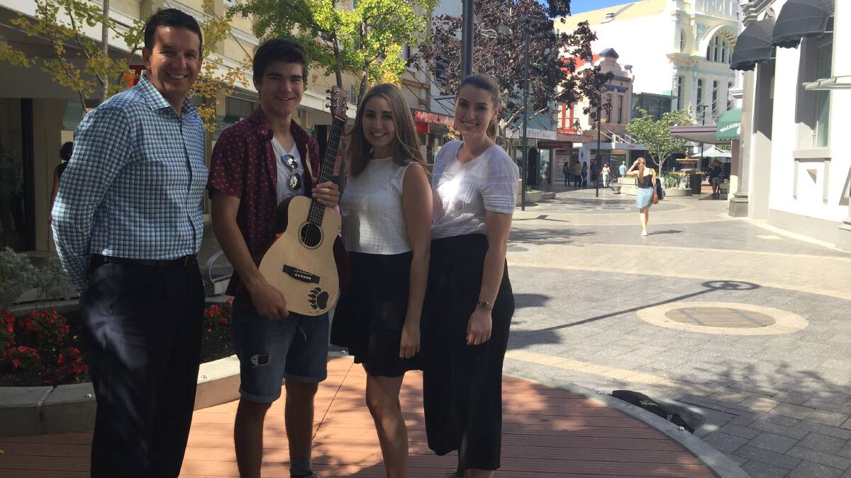 COMPETITION READY: Sponsor and Telstra licensee ANdrew Doyle, musician Cody Gunton, Cityprom's Laura Wilson and the City of Launceston's youth development officer Claudia Garwood. Picture: Holly Monery