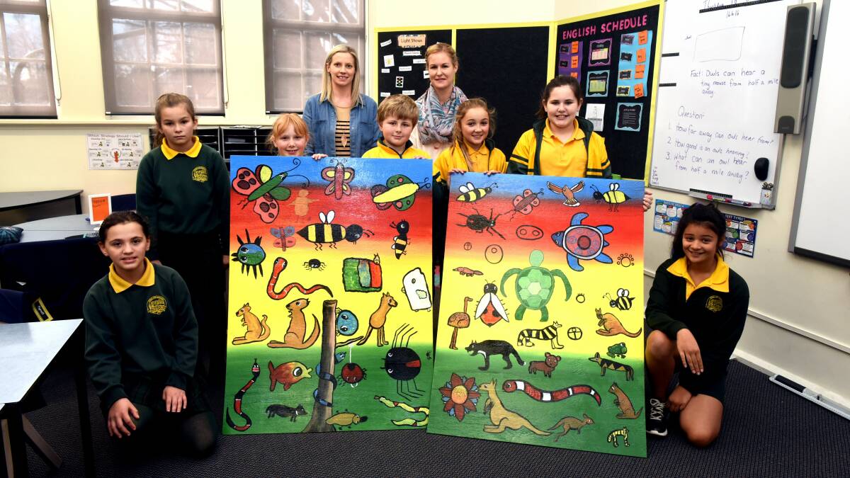 ART: Longford Primary school students with their artwork Aaliyah Bellchambers, Chiquita Eastley, Mae Gilligan, Jock Johnston, Hailey Barden, Bree Lavell and Bianca Elliott with teachers Kayla Farron and Rhiannon Morrison. Picture: Neil Richardson
