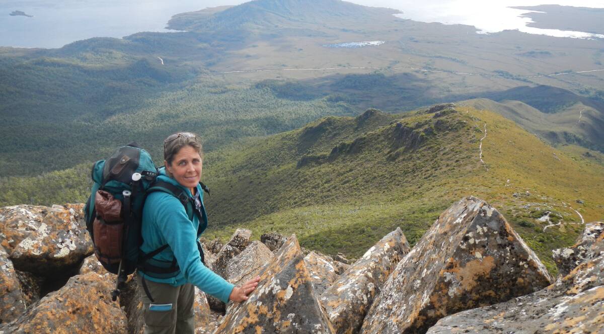 NATURAL EXPLORER: Dr Denise Hardesty bushwalking at Mt. Anne. Dr Hardesty said she feels at ease visiting remote areas of the world. Picture: Supplied.