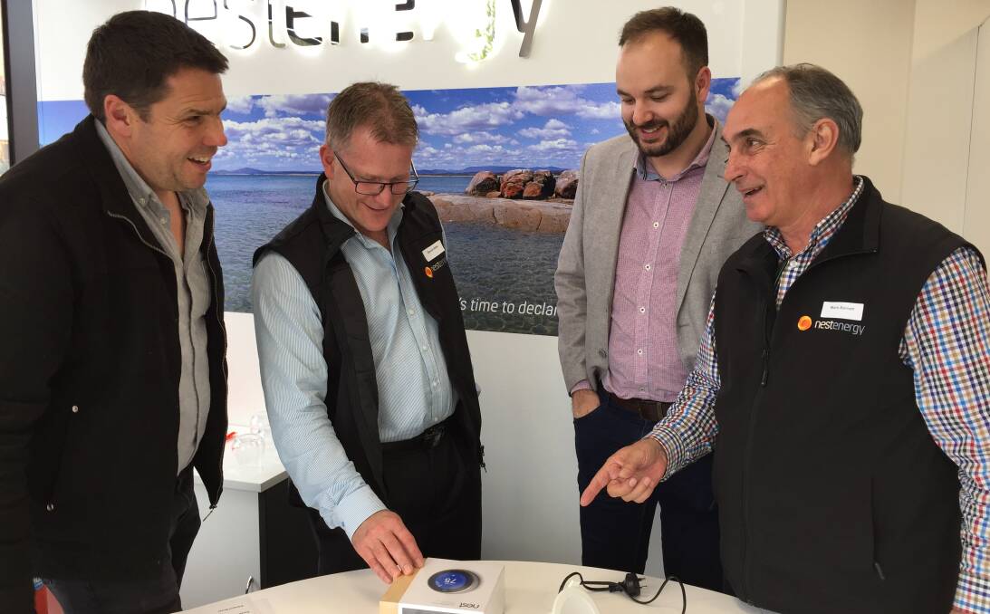 ENERGY FUTURE: Nest Energy directors Adam Clayton and David Hillier, with building surveyor Adam Jones and director Mark Barnett at the Nest Energy showroom launch party on Friday. Picture: HOLLY MONERY.