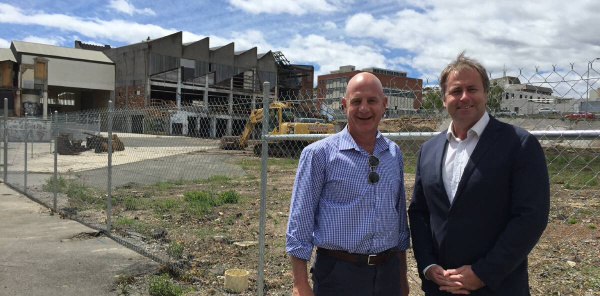 LOAN APPROVED: Treasurer Peter Gutwein and City of Launceston deputy mayor Rob Soward at the infamous CH Smith site. Picture: Holly Monery