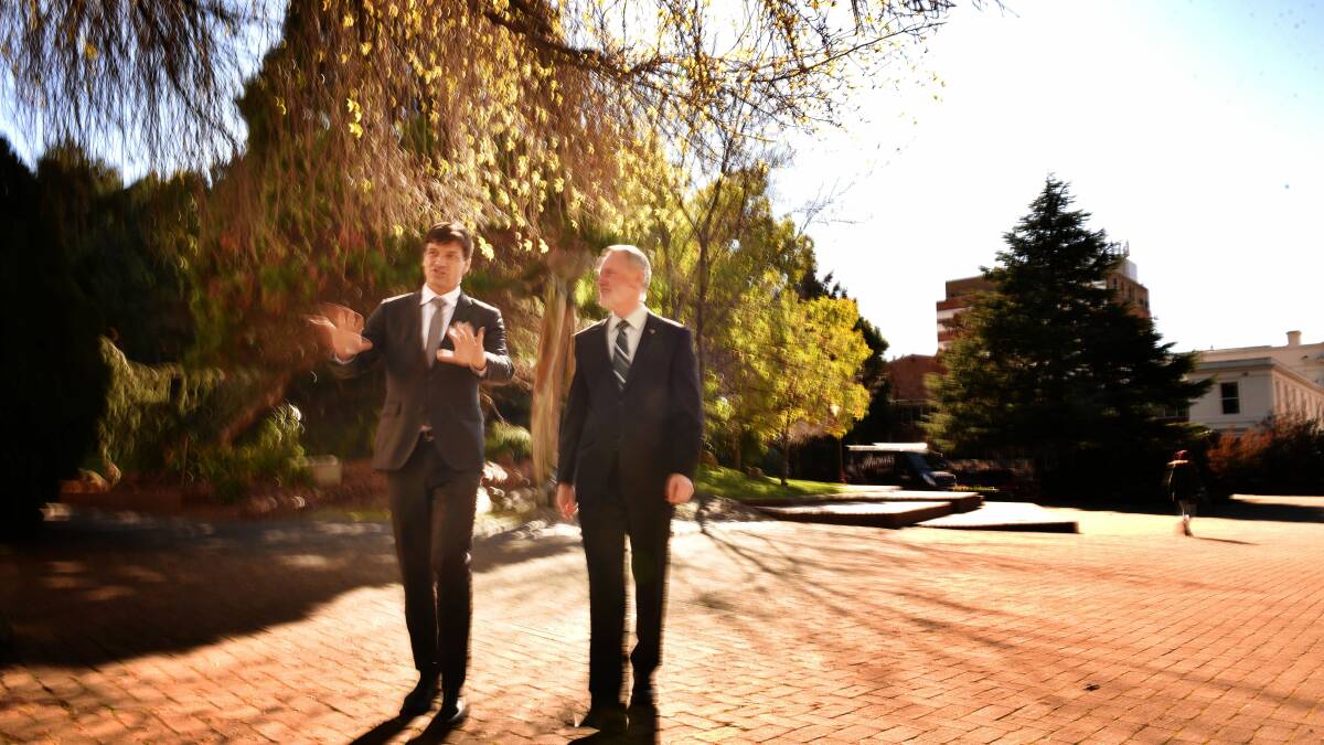 Federal Assistant Minister for Cities Angus Taylor and Launceston Mayor Albert van Zetten discuss the planned transformation of Civic Square on Thursday. Picture: Scott Gelston.