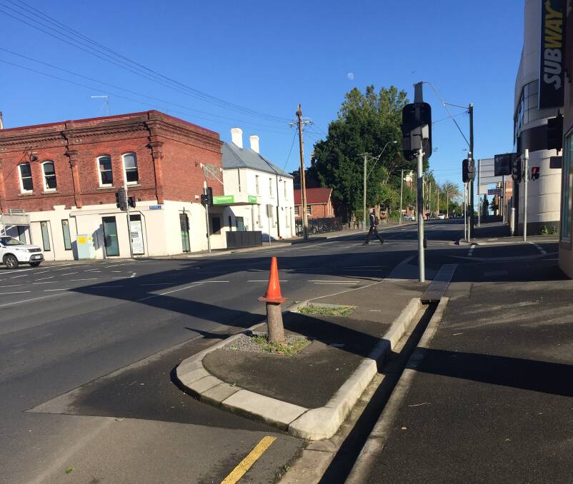CUT DOWN: The council-managed tree on the corner of Wellington and Brisbane Streets has been removed, after it was subject to vandalism. Picture: Zona Black