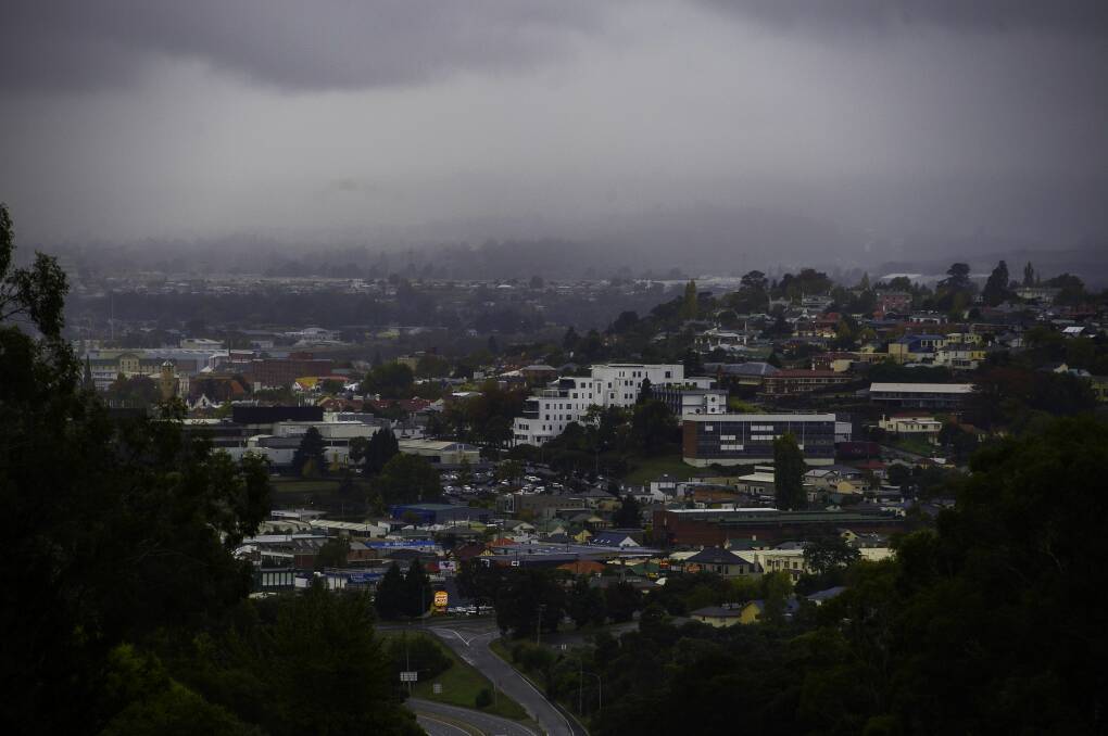 STORMY SKY: Low level cloud hanging over the city of Launceston as wet weather sets in late in the day on Sunday afternoon. Picture: Scott Gelston.