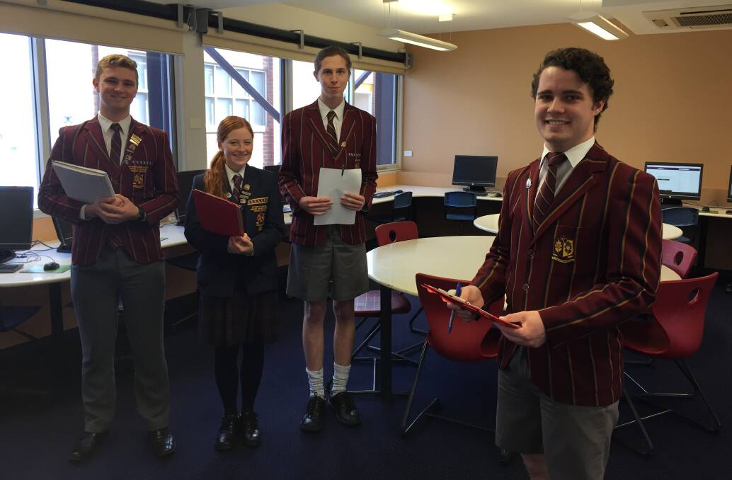 VOTE READY: Scotch Oakburn College students Ben Grayson, 18, Victoria Eastoe, 17, Max Stevens, 18, and Lachlan Hinds, 18, prepared to help other students enrol to vote.