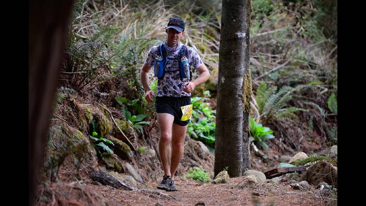COMPETITIVE EDGE: Nicholas Hay in the thick of the trail fest on the first day of competitions in 2016. The three-day running festival took place in Derby in the North-East of Tasmania. Pictures: Phillip Biggs