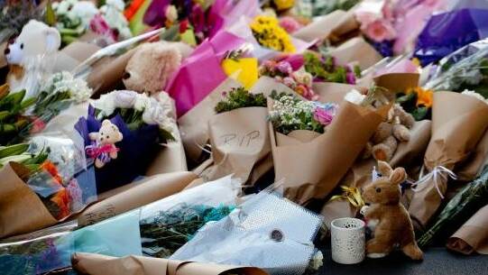 Mourners paid tribute to those killed in the Bourke Street Mall on Friday. Photo: Arsineh Houspian