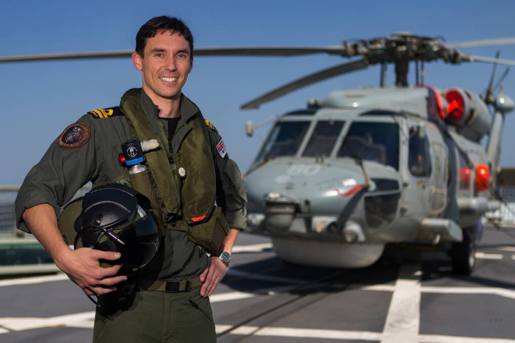 PROUD: Former Launceston Church Grammar School student Lieutenant Caleb Muggeridge is a Navy Seahawk helicopter pilot.