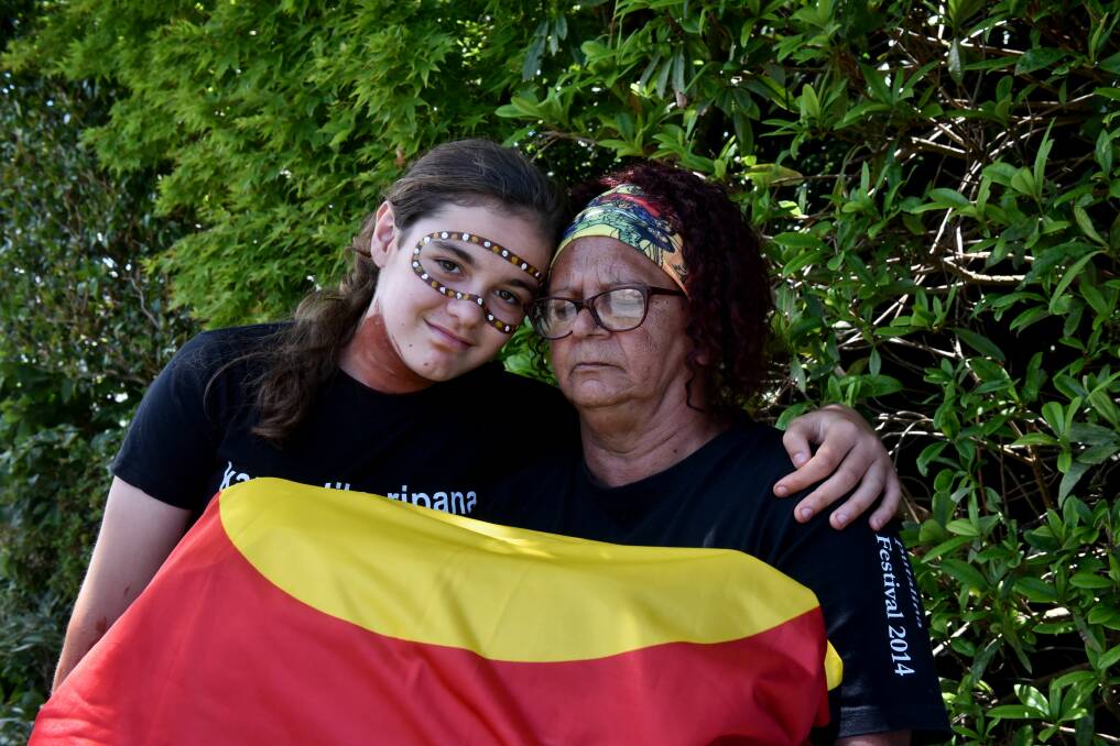 FINALLY HOME: Members of Tasmania's Aboriginal community emotionally welcomed home the ancestral remains at Launceston Airport on Tuesday. Picture: Neil Richardson