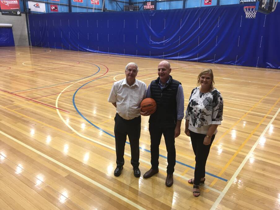 BASKETS: Elphin Sports Centre's Peter Dunphy, Treasurer Peter Gutwein and Northern Tasmanian Netball Association's Michelle Woodiwiss. Picture: Holly Monery