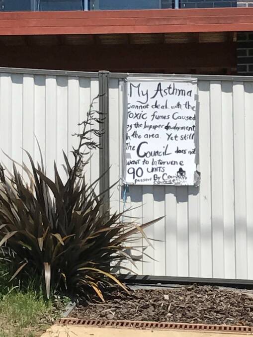 Signs of residents still opposed to the development
