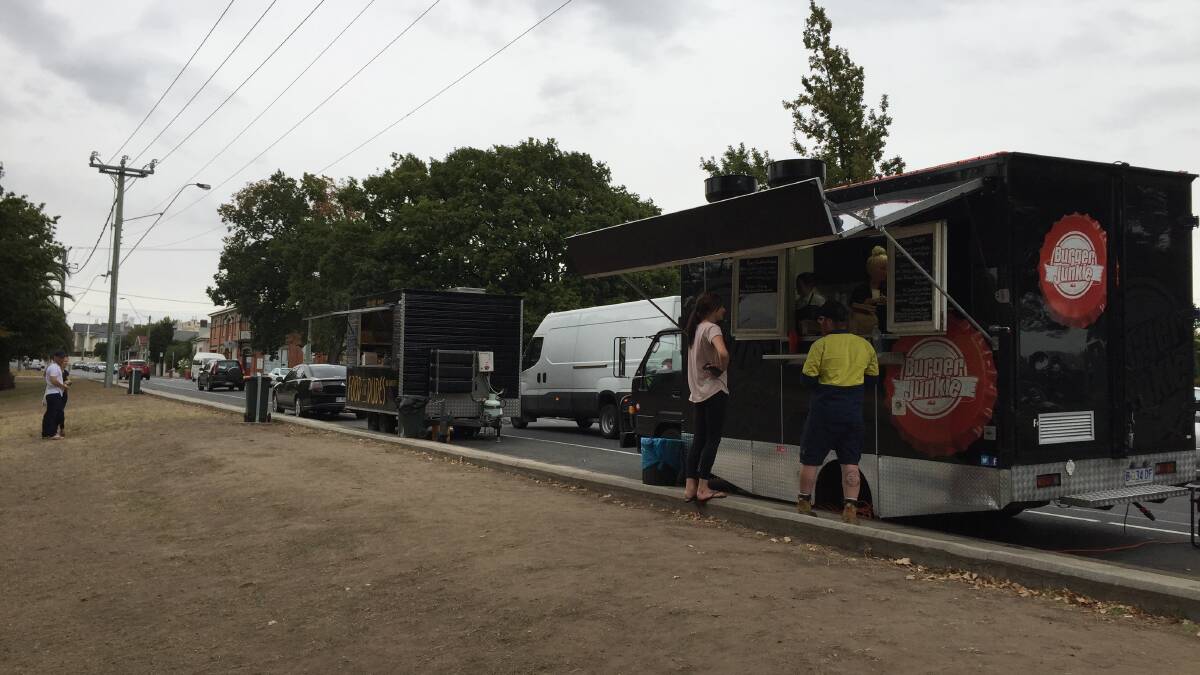 CHANGES AHEAD: Two of the regular food vans on High Street in Launceston, Food for Dudes and Burger Junkie. The site is under review. Picture: Holly Monery