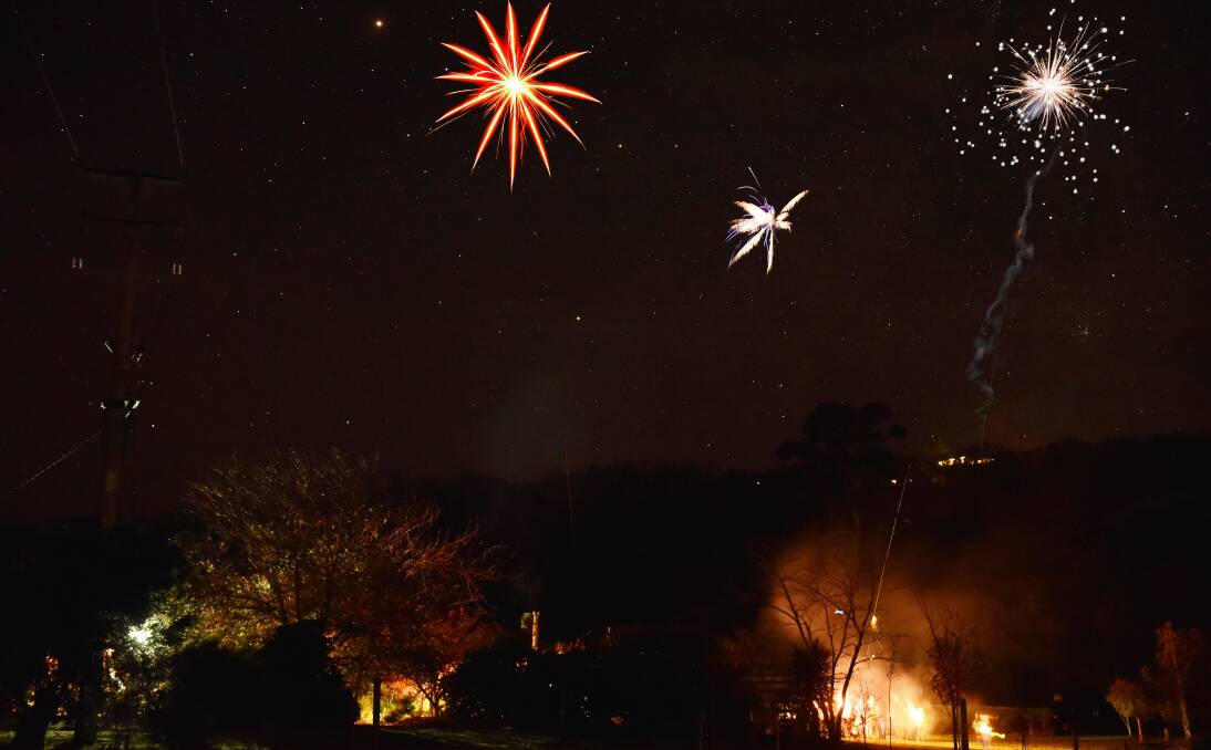 CRACKERS LIGHT UP THE NIGHT: An array of fireworks illuminate the sky on Saturday at the Frankcombe property near Waverley. Composite Picture: Scott Gelston