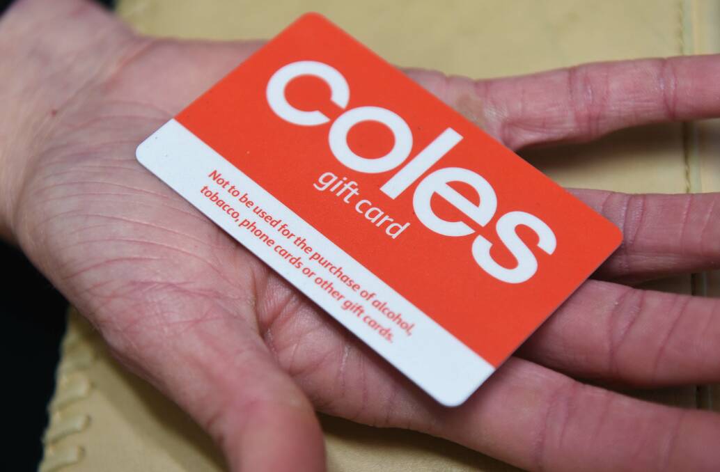 FOOD SUPPORT: The City Mission supply Bianca with Coles gift cards so she can put food on the table. Picture: Neil Richardson