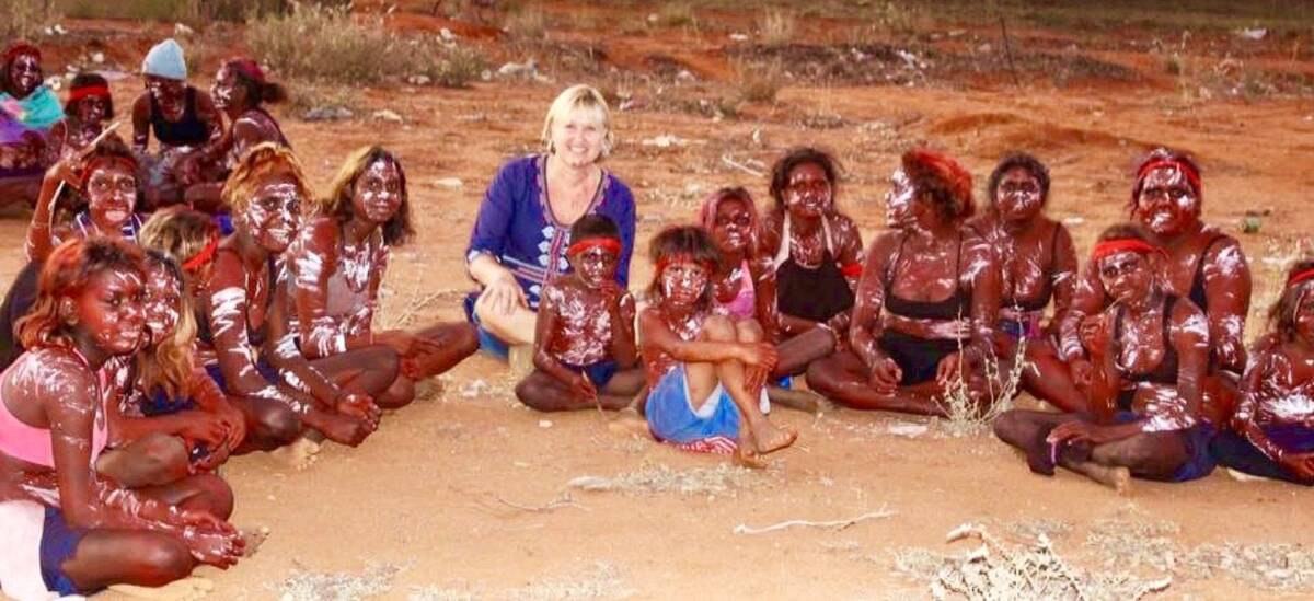 ABOVE: Anita Ramage with women from Warralong. Picture: Australian Outback Photography