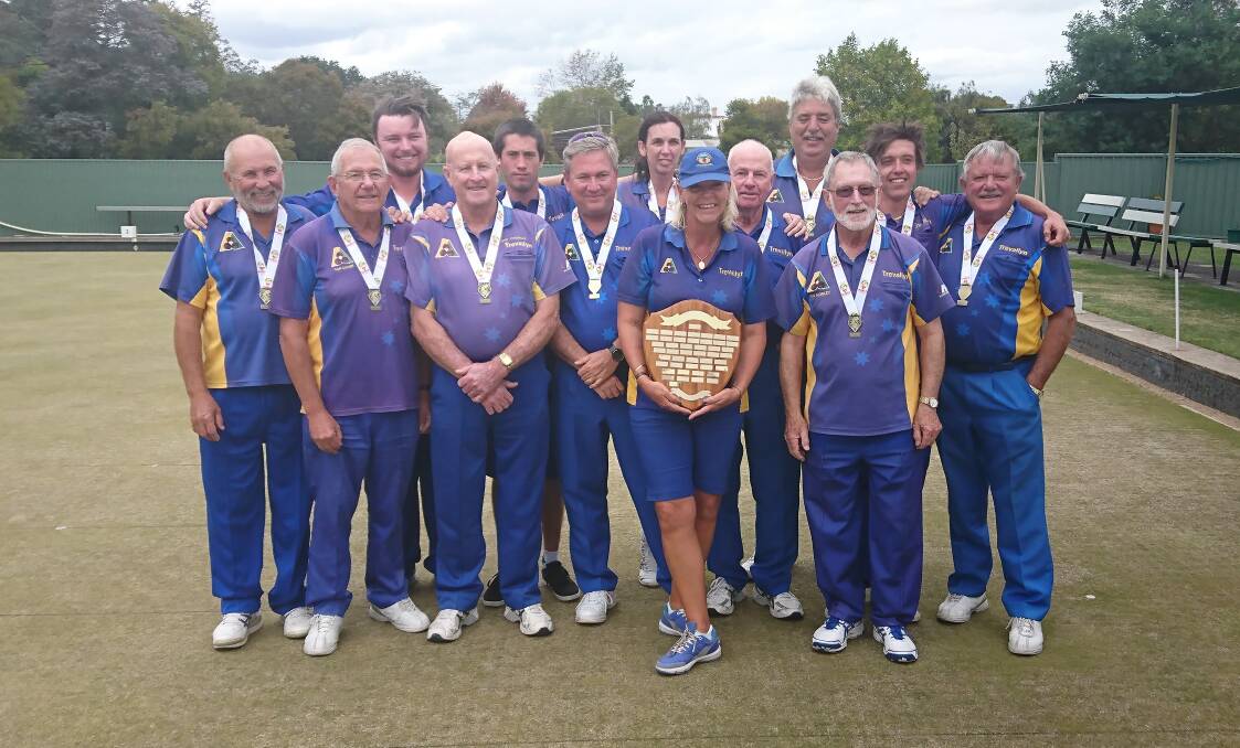 Top team: The winning Trevallyn Bowls Club team with its shield after taking out the State Thursday Pennant division one title. Picture: Brad Cole.