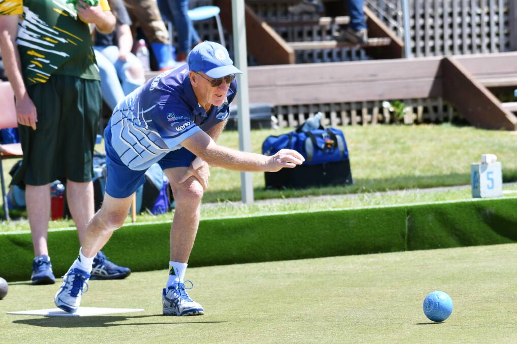 Penguin's David Osborne delivers his shot during the Premier League match against South Burnie on Saturday. Picture: Brodie Weeding.