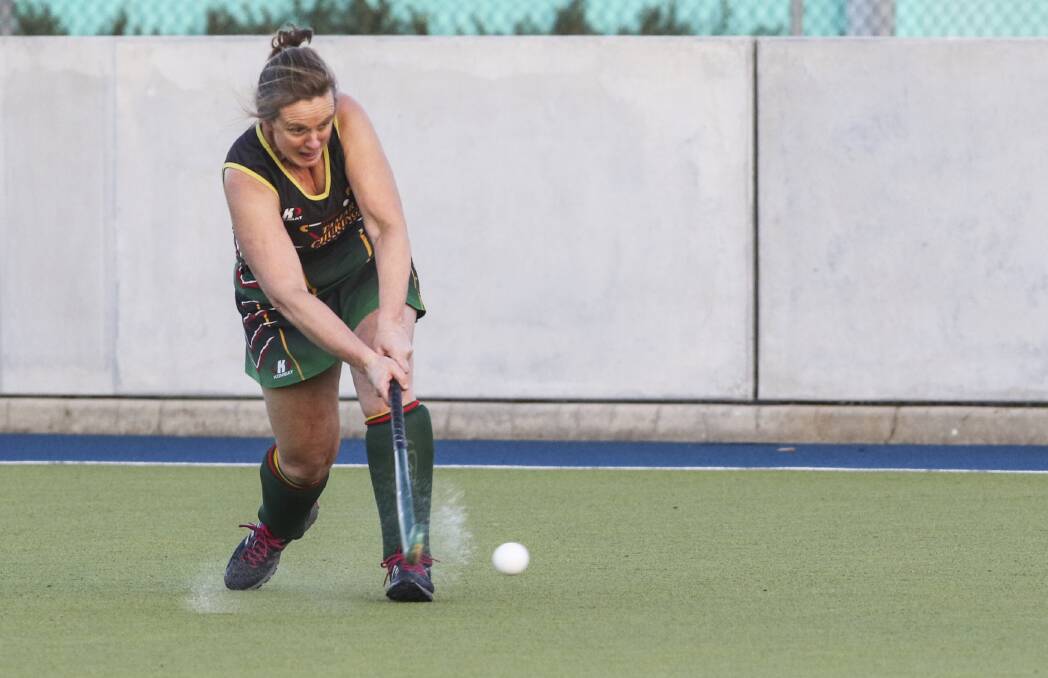 Thunderstick: Tamar Churinga's Liz Illingworth belts the ball up the pitch during the Greater Northern League game against Devonport. Picture: Cordell Richardson.

