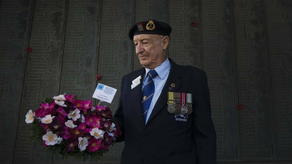War veteran John Meager pays his respects. Picture: DARREN HOWE