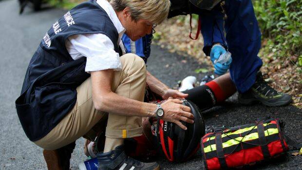 Richie Porte receives medical treatment on the roadside. Picture: Getty Images
