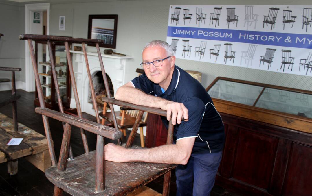 VINTAGE: Roger Nutting looks over a Jimmy Possum-style chair at the Great Western Tiers Information Centre. Pictures: Hamish Geale 