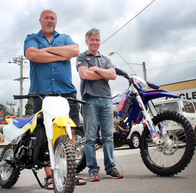 BIKE BOOST: Launceston Junior Motorcycle Club vice-president Graeme Popowski and CycleWorld manager Brett Kelly prepare for LJMCC's charity day on Sunday. Picture: Hamish Geale 