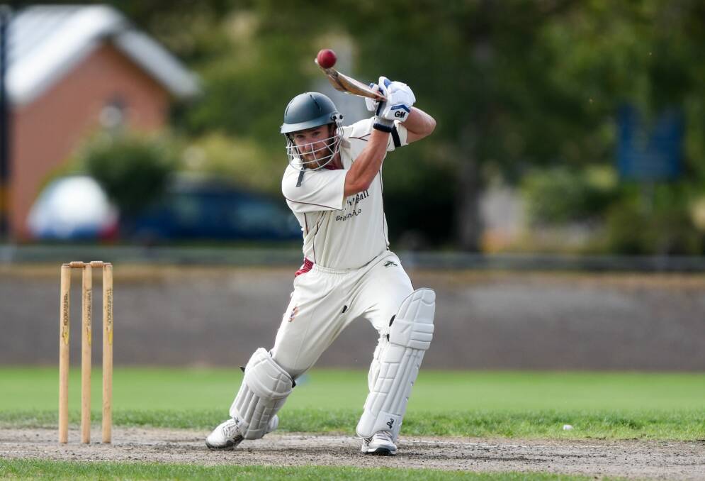 COMETH THE HOUR: Westbury skipper Richard Howe cracks a drive through the covers. Picture: Paul Scambler