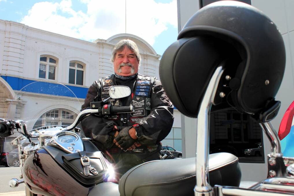 MAN ON A MISSION: Hobart property inspector Leon Cupit is writing a book detailing Tasmania's best motorcycle routes for visitors. Picture: Hamish Geale 