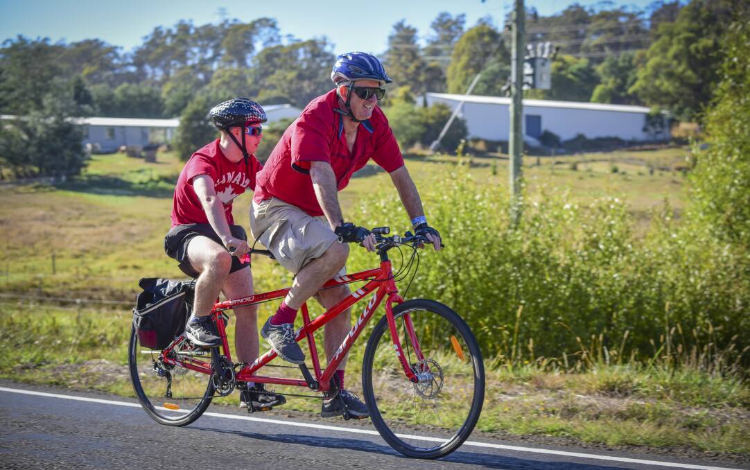 PEDAL POWER: Launceston's Paul and Rupert Grayson take a tandem bike through Traveller's Rest at Sunday's Western Tiers Cycle Challenge. Picture: Paul Scambler 