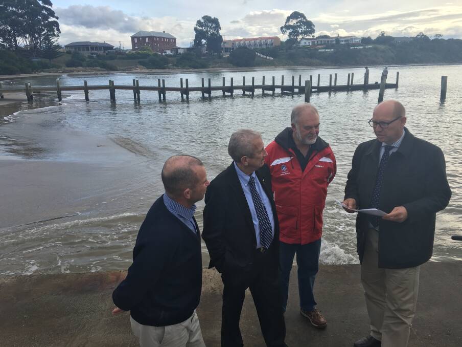 TURNING THE TIDE: MAST's Peter Hopkins, Glamorgan Spring Bay Council mayor Michael Kent, Swansea Marine Rescue's Col Barney and Liberal Lyons MHR Eric Hutchinson discuss plans for the Swansea jetty. Picture: Supplied 