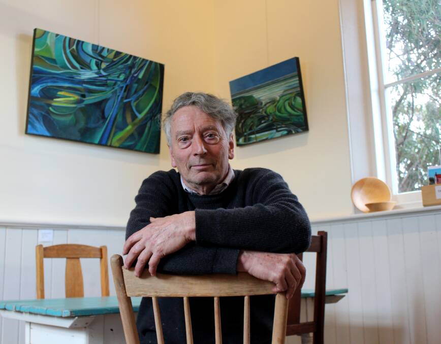 WALL ART: Launceston painter Richard Crabtree. The landscape artist will have a selection of works on show at Perth's Ut Si Cafe until early next month. Picture: Hamish Geale 