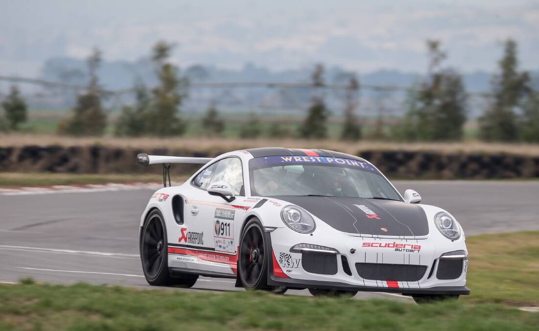 SPEEDY: Victorian driver Matt Close rips around the Symmons Plains track in a Porsche 911 for Hot Laps day on Saturday. Picture: Angryman Photography 