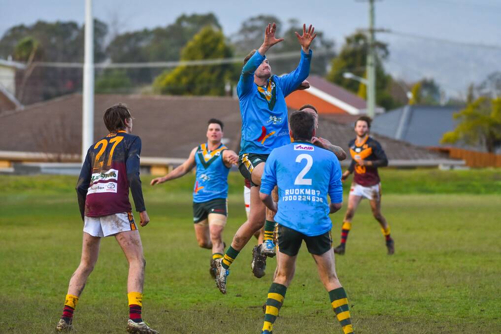 ELEVATION: Harry Chapman leaps in the air to take a grab for St Pats. The Saints kicked a three-figure total to hand Old Scotch their first loss for the season. Picture: Scott Gelston