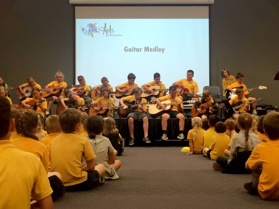 GUITAR GROUP: Exeter Primary School's guitar group performs a track at the school's arts afternoon. Picture: Supplied