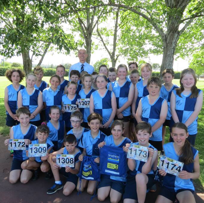 TRI TEAM: Perth Primary School's triathlon team with Diabetes Tasmania ambassador Guy Barnett. Funds raised at the Schools Triathlon Challenge are donated to Diabetes Tasmania. Pictures: Supplied 