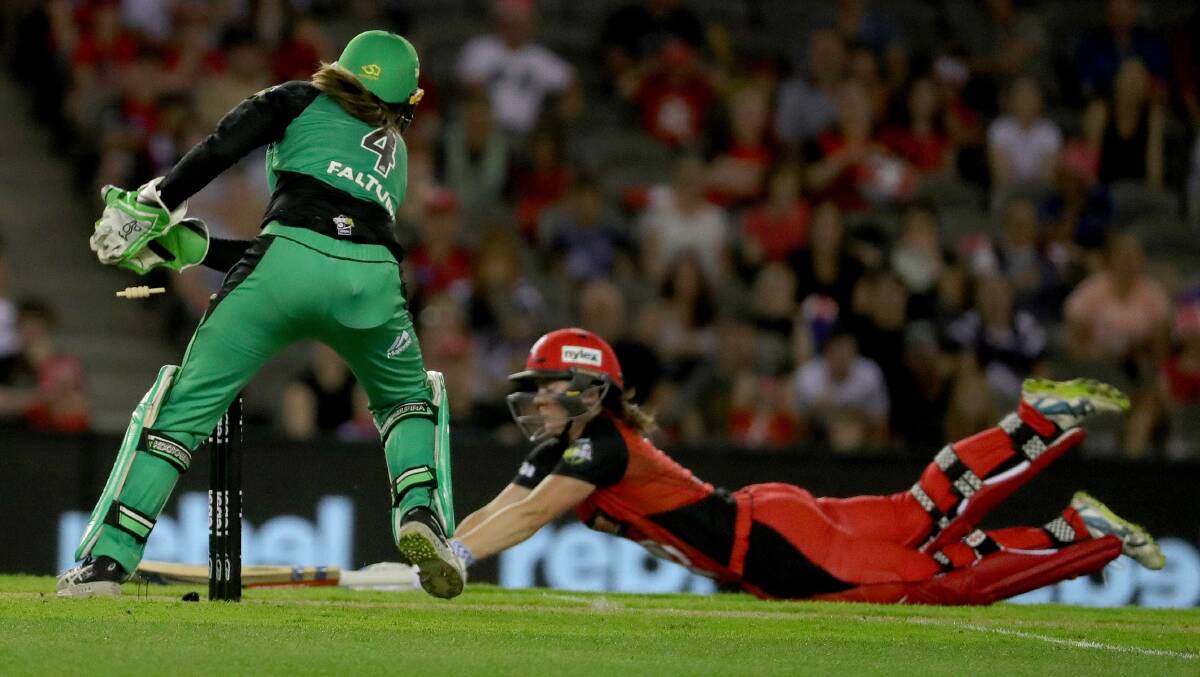 Webb dives to make her ground against the Melbourne Stars. Picture: AAP