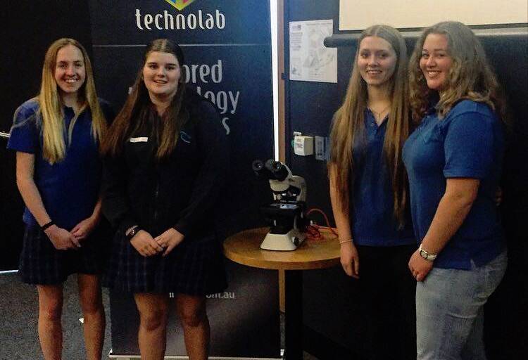GREY CELLS: St Helens District High School's winning Brain Bee team Hannah LeFevre, Lauren O Sullivan , Gemma McArthur and Lily Haley. The team won a brand new microscope for the school. Picture: Supplied