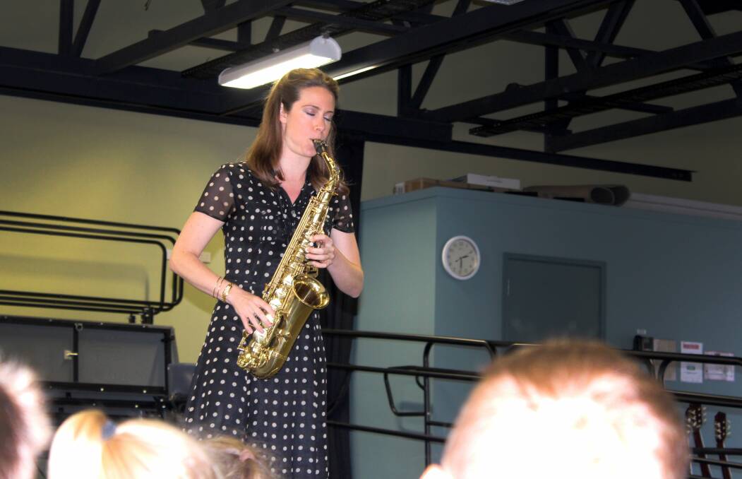 HITTING THE RIGHT NOTE: London saxophonist Amy Dickson visited Mowbray Heights Primary School on Thursday ahead of her gig with the TSO on Saturday. Picture: Hamish Geale 