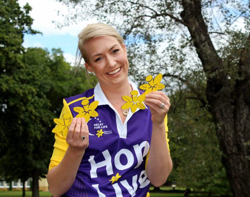 ALL YELLOW: And Co. founder and reigning Tasmanian Young Innovator of the Year Jodie Snooks will pitch in for Cancer Council fundraising efforts by running a stall at this year's Relay For Life. Picture: Hamish Geale 