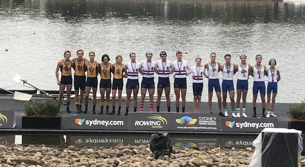 LINED UP: Scotch's under-19 coxed four on the podium. 