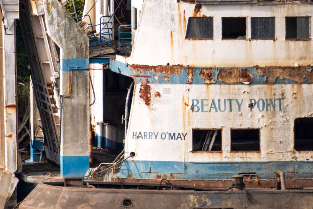 The Harry O'May is one of several wrecks tied up on the Tamar River shoreline. Picture by Phillip Biggs 