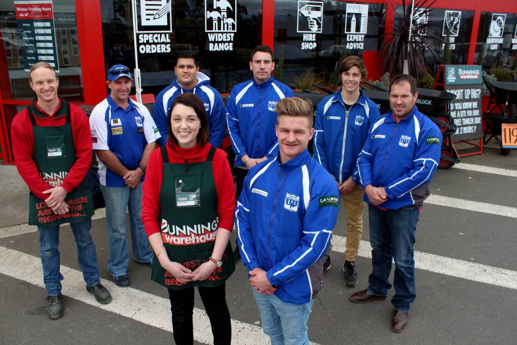 FLOOD BUDS: Bunnings Kings Meadows activities organiser Emily-Rose Maloney and Deloraine coach Ben Killalea. Bunnings donated new carpet, doors and cupboards to help the club recover from the June floods. Picture: Hamish Geale