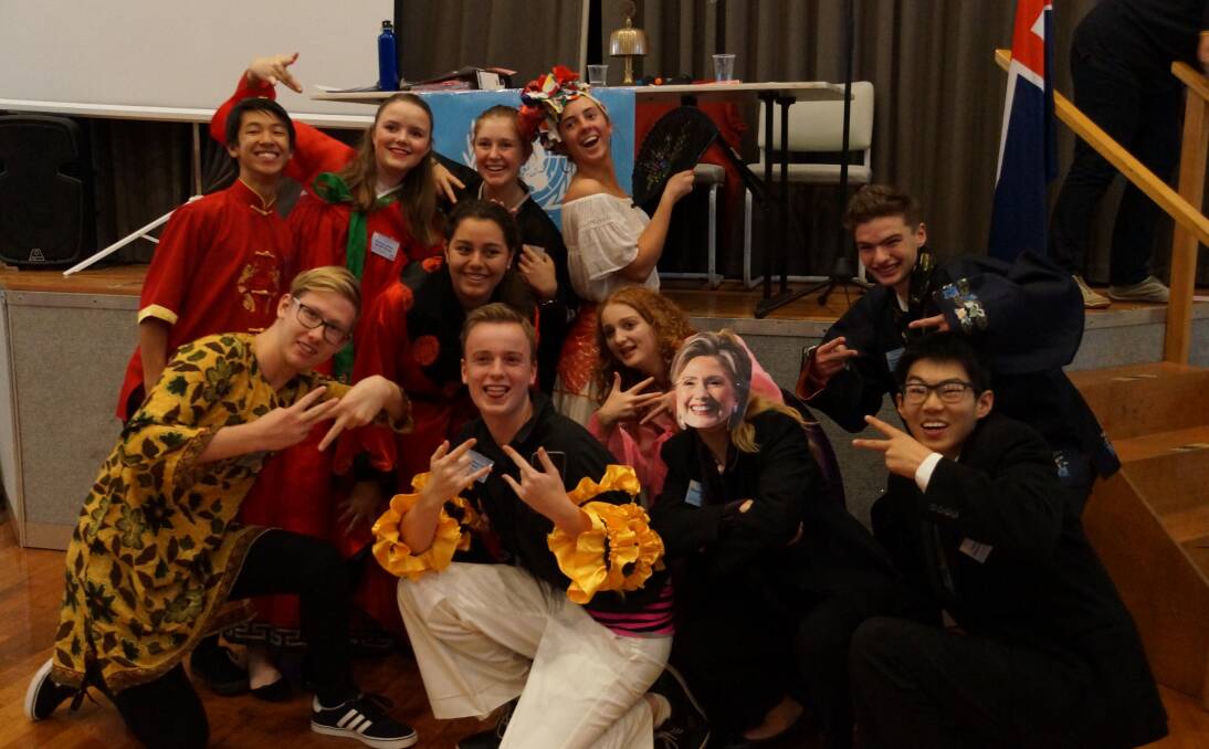 UNITED EDUCATIONS: MUNA participants from across the state take time out from solving the world's problems to enjoy a lighter moment at this month's Deloraine Rotary Club event. Picture: Supplied