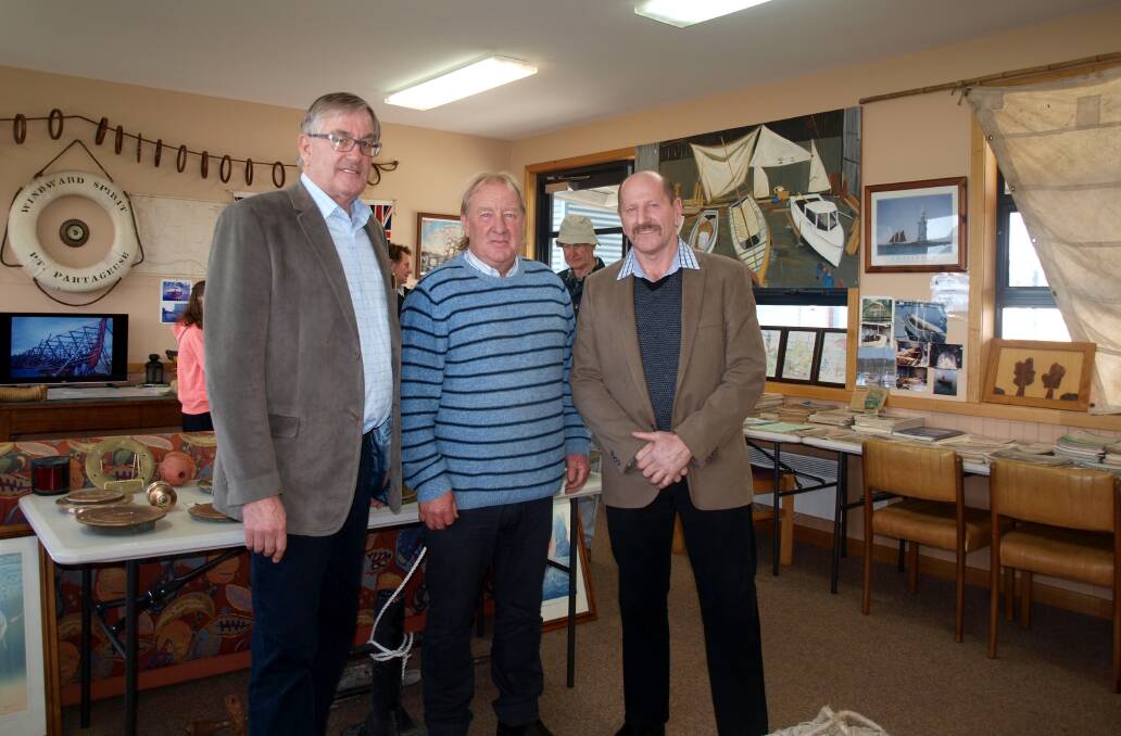 MAIDEN VOYAGE: Infrastucture Minister Rene Hidding and Break O'Day mayor Mick Tucker flank Les Sims at the opening of the Maritime and Heritage Collection. Picture: Jayne Richardson 
