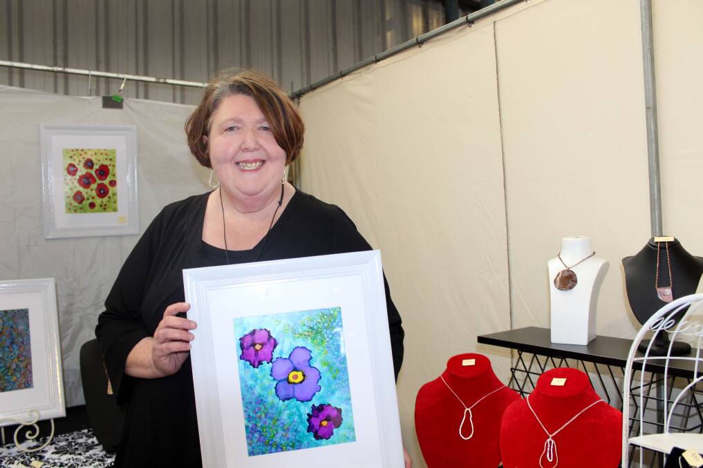 EYE CATCHING: Longford's Gayle McLucas took time to discover her own style. The painter now creates jewellery and artwork for her own label Gayle M Designs. Picture: Hamish Geale 
